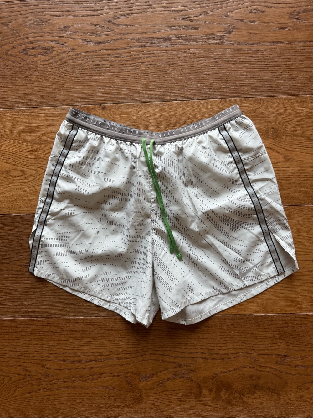 Nike Men’s White Athletic Shorts with Green Drawcord and Black Piping